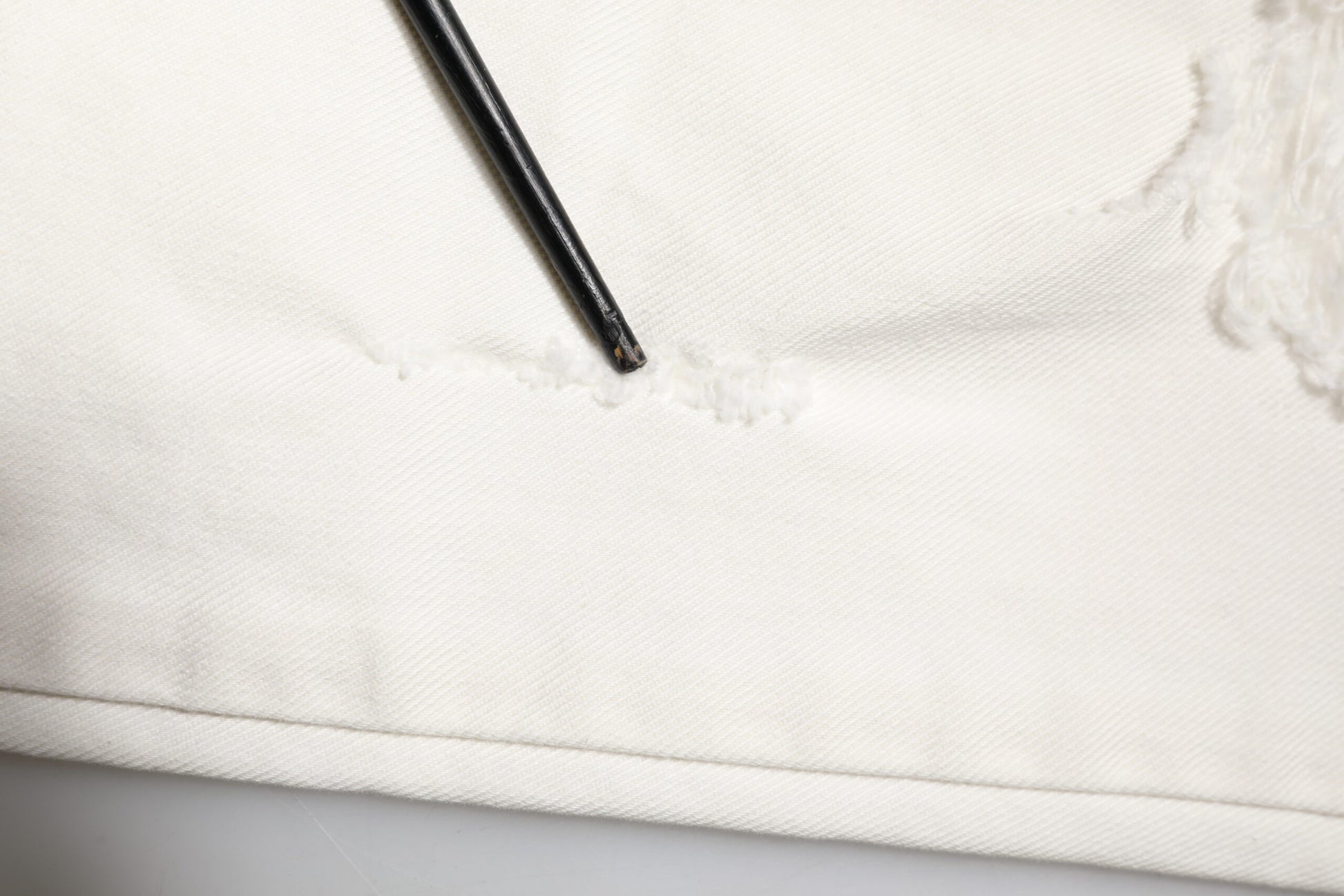 White Tattered Graffiti Skinny Denim Jeans